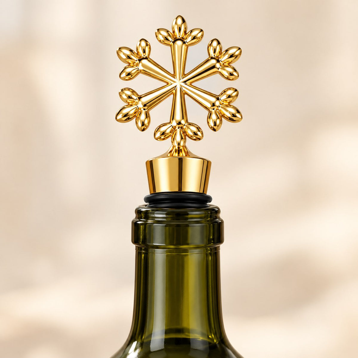 Gold snowflake wine stopper sealing an opened wine bottle