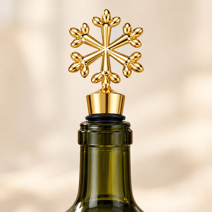 Gold snowflake wine stopper sealing an opened wine bottle